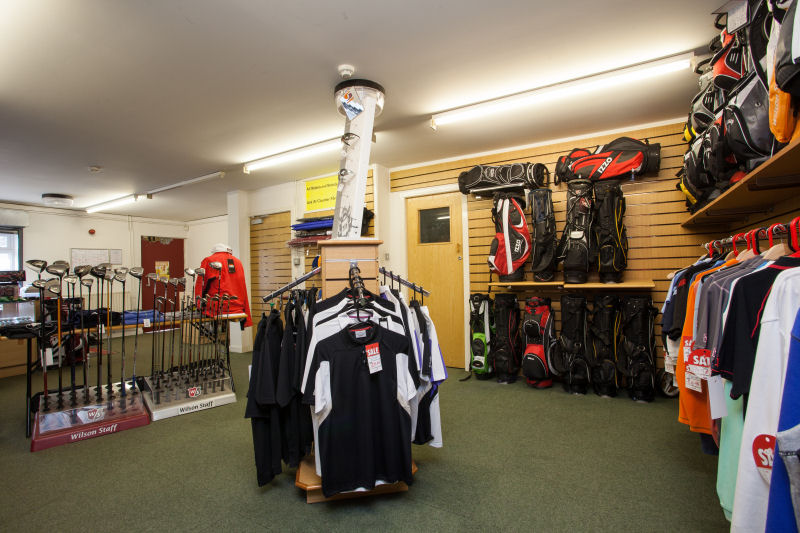 image of Inside the Pro Shop - polo shirts and putters